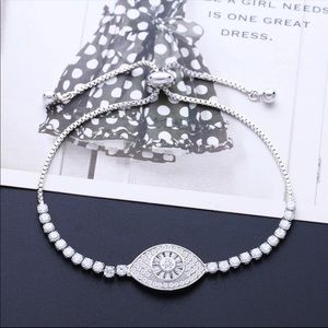 Silver evil eye bracelets with Swarovski c…